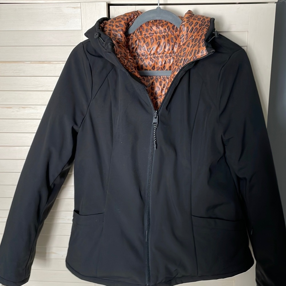 Reversible black and leopard print jacket.